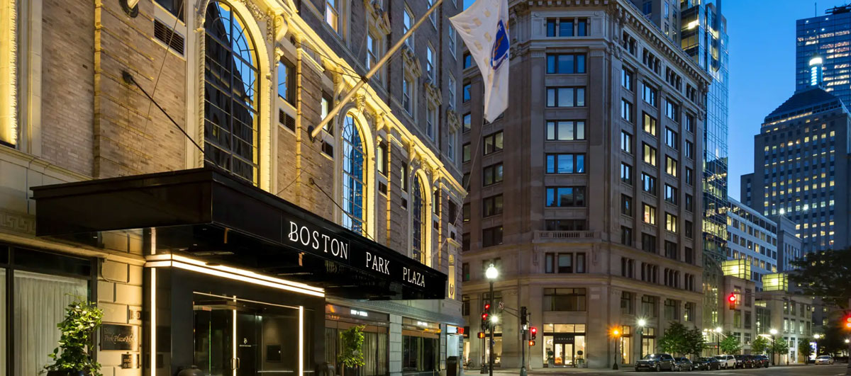 Nighttime exterior photo of Boston Park Plaza